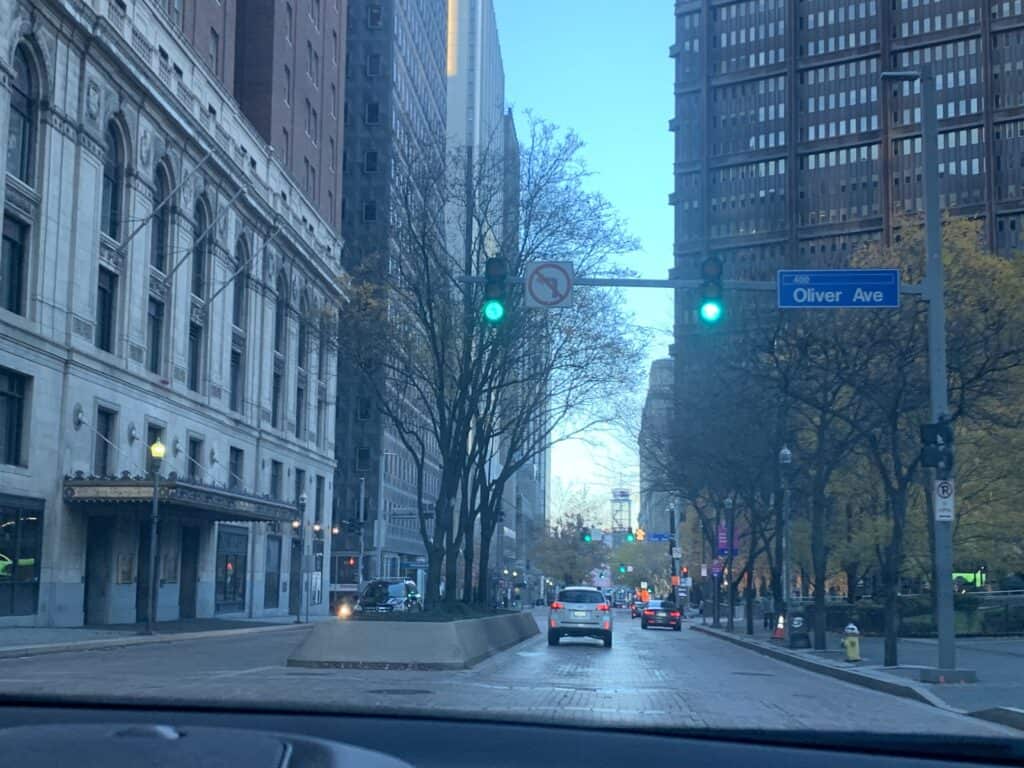 A car driving down a street.
