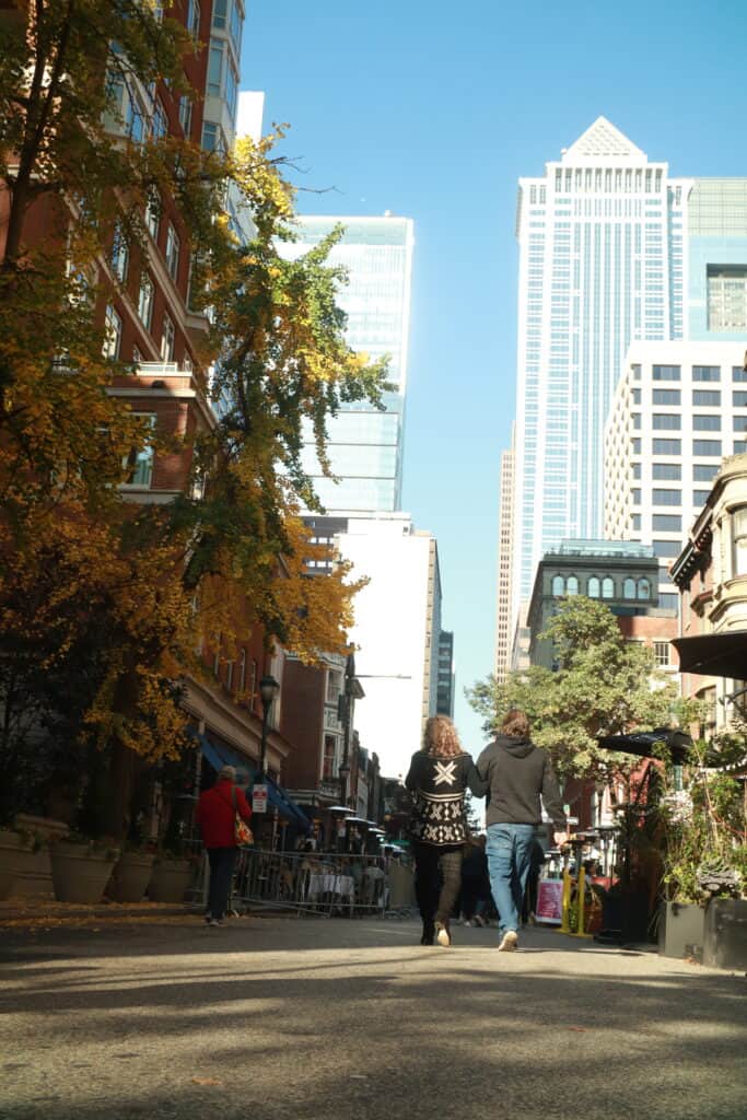Two lawyers walking down a city street.