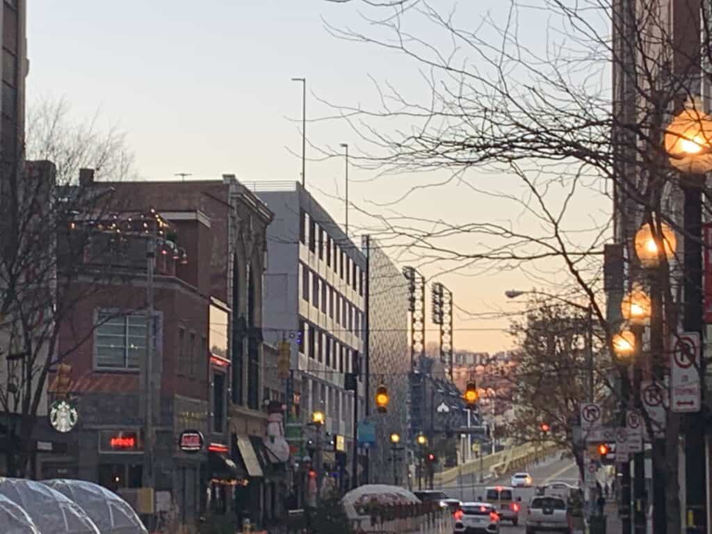 A city street at dusk.