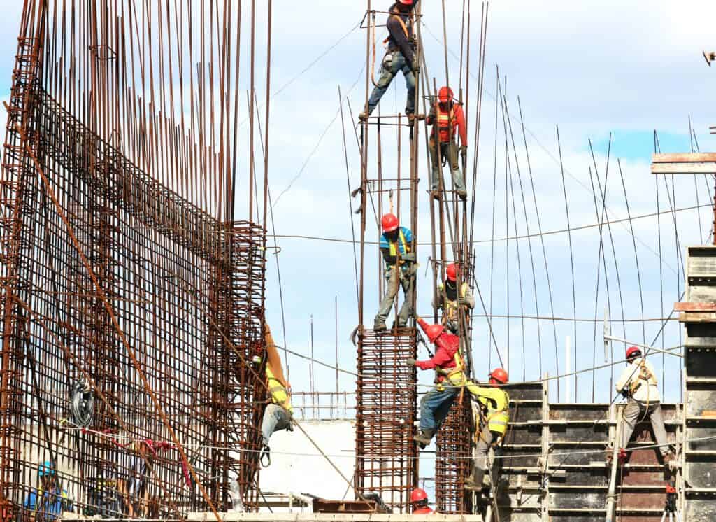 A group of construction workers on a construction site.