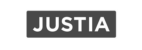 The image shows the word "JUSTIA" in bold, white capital letters on a dark gray rectangular background.