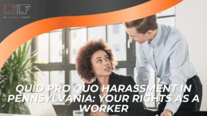 A woman sits at a desk looking up at a man standing beside her. Text reads: “Quid Pro Quo Harassment in Pennsylvania: Know Your Worker Rights.”.