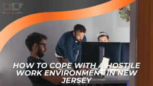 Office scene with coworkers at computers introducing guidance on coping with hostile work environments under New Jersey law.